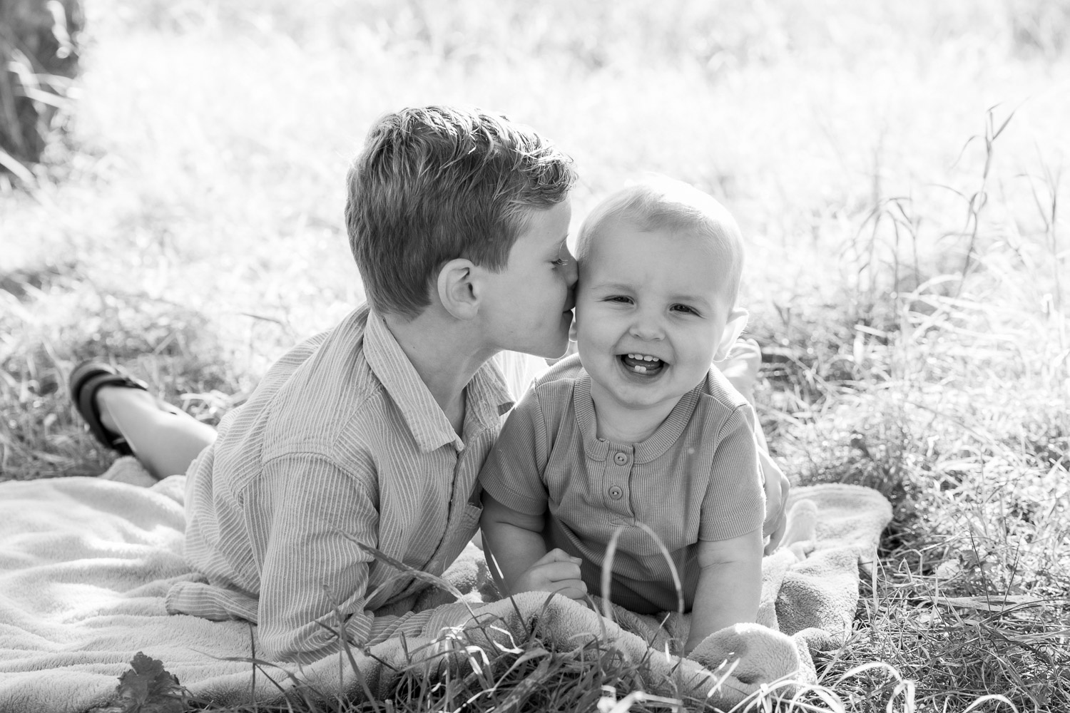 Familie fotoshoot door Dasja Dijkstra van Das Knuss Fotografie Brediuspark Woerden fotoshoot fotograaf Woerden